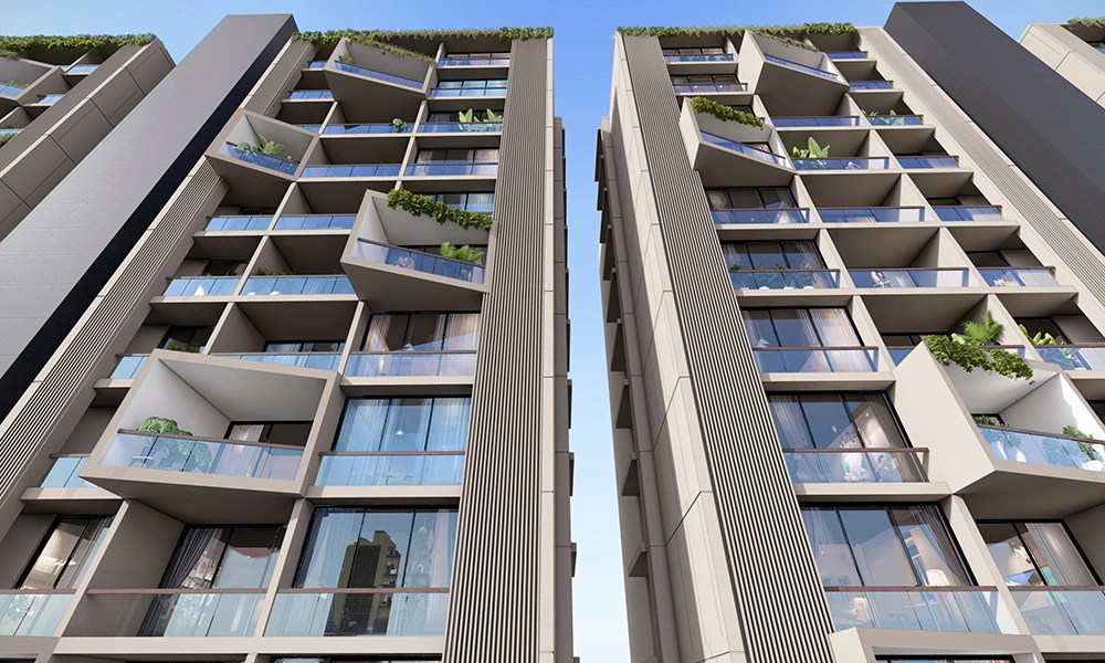 Low angle shot of residential tower at Sarthak Solitaire with modern facade lines