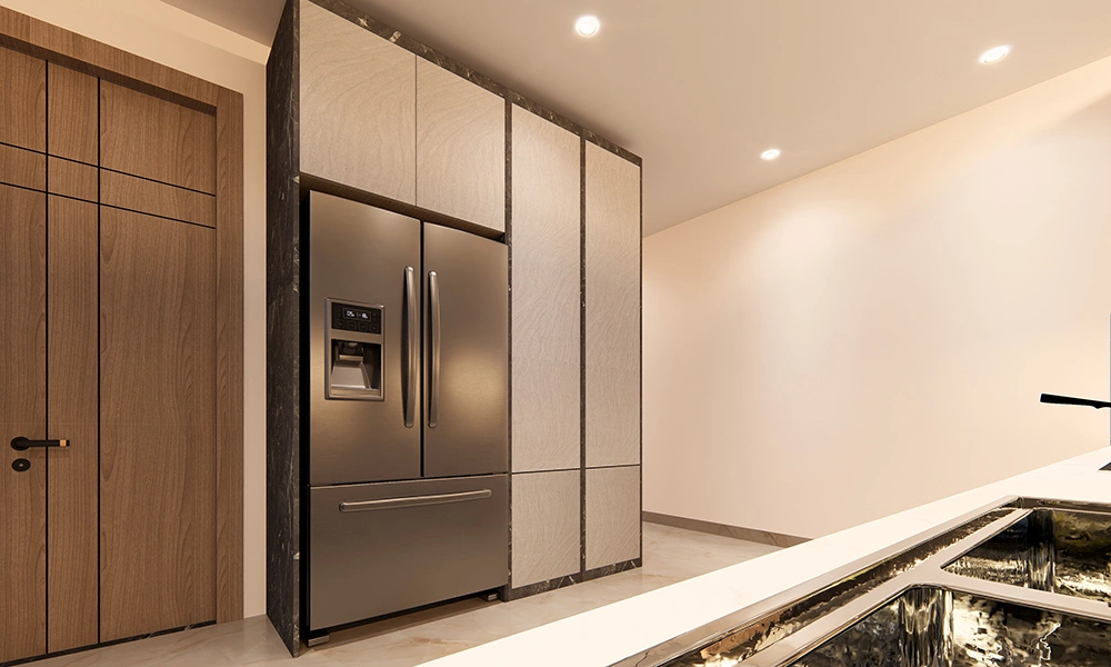 Premium kitchen section in Sarthak Solitaire flats in Bicholi Mardana Indore with modern cabinetry and fridge space