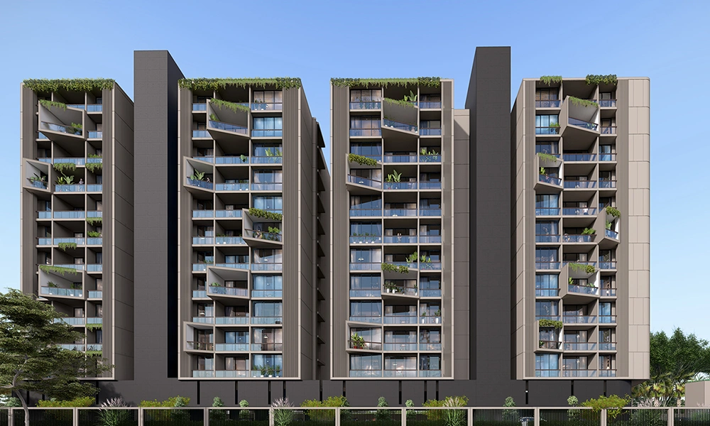 Front elevation of Sarthak Solitaire towers with balanced design and open surroundings